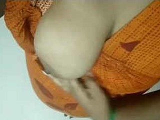 Tamil girl masturbates with her breasts