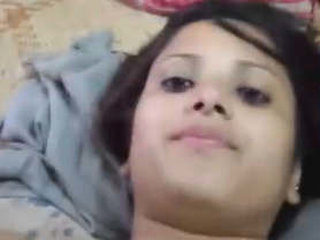 A cute girl gets down and dirty with her lover in the comfort of her own home