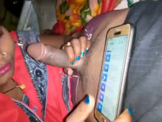 Oral sex and handjob in a steamy video