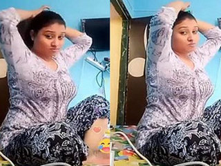 Watch a hot Indian aunt with big tits in action