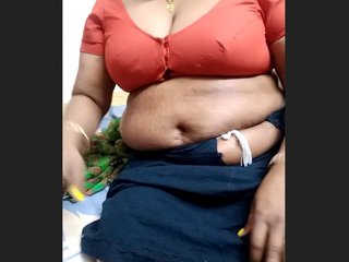 Mature aunt in a blouse gets naughty