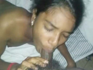 Watch a Tamil girl perform a blowjob in a steamy video