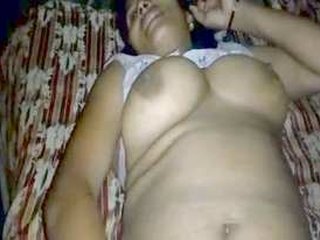 Desi bhabi takes on a big dick and moans in Hindi audio