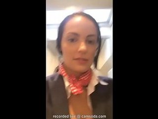 Solo female masturbation in the bathroom of an airplane