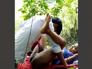Desi couple enjoys steamy outdoor sex in village