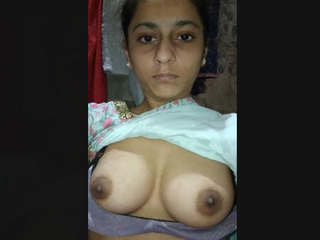 Young Muslim girl reveals her breasts