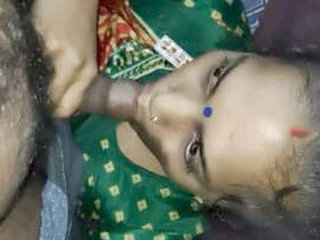 Desi Bhabhi gives a blowjob in a village setting