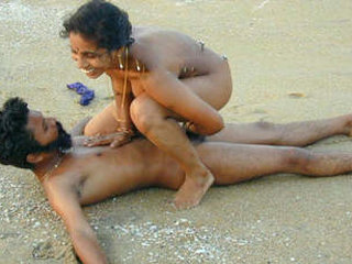 A South Asian couple has a pleasurable experience on the beach in a leaked premium video