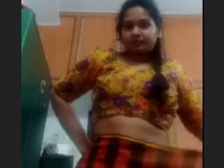 Cute Tamil girl brushes and cleans her pussy in a naked video
