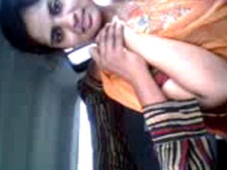 Car sex with a busty brunette