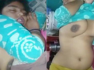 Desi couple records sleeping girlfriend's boobs in bed